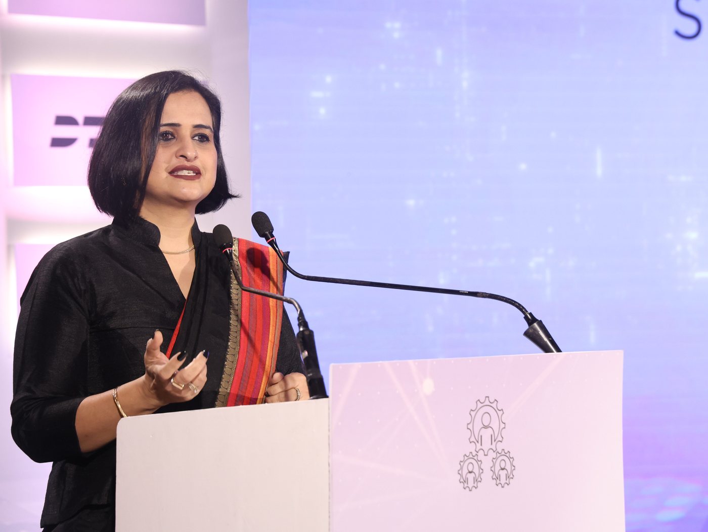 Mugdha Kalra delivering a keynote address